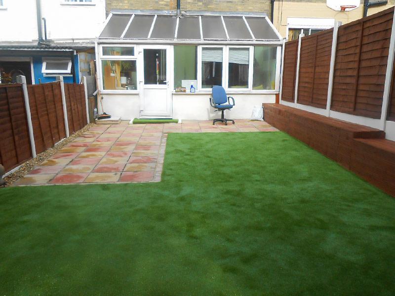 the new artificial lawn and cleaned patio